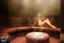 Relaxed Woman in Sauna