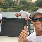 Algarve hot tub personel sitting on the car trailer used for transporting hott tubs.